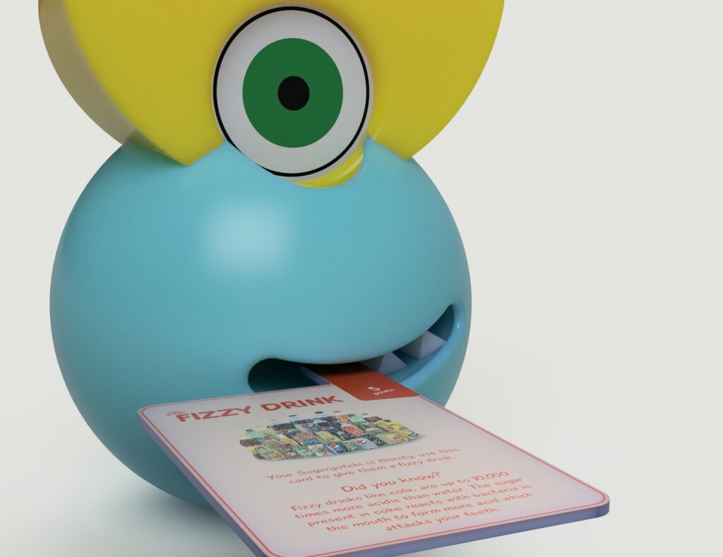 The Sugargotchi — a friendly blue digital pet character at home